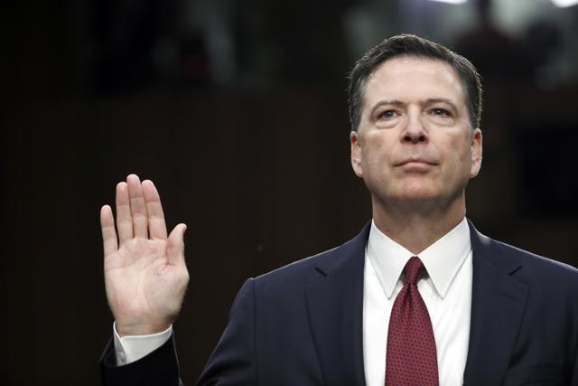Former FBI director James Comey is sworn in during a Senate Intelligence Committee hearing on Capitol Hill. (AP Photo) Former FBI director James Comey is sworn in during a Senate Intelligence Committee hearing on Capitol Hill. (AP Photo)