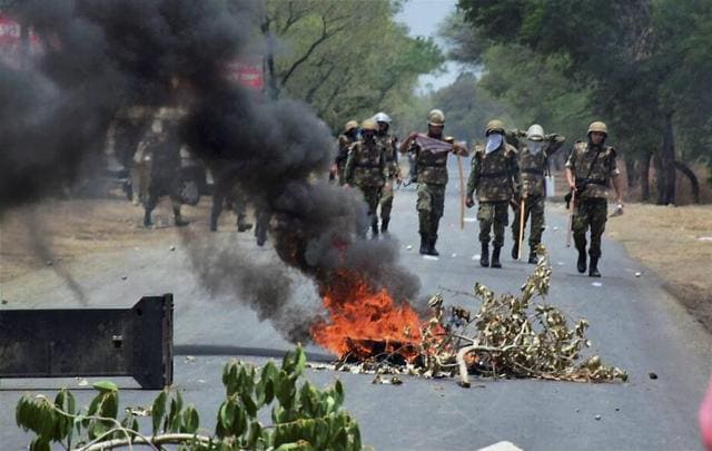 Indore: Farmers stage protest at Indore-Bhopal highway on Friday. (PTI) Indore: Farmers stage protest at Indore-Bhopal highway on Friday. (PTI)