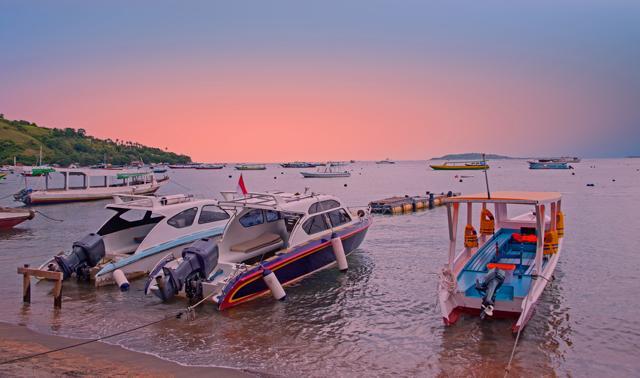 Boats on the beach at Gili Trawangan at sunset. (Shutterstock)