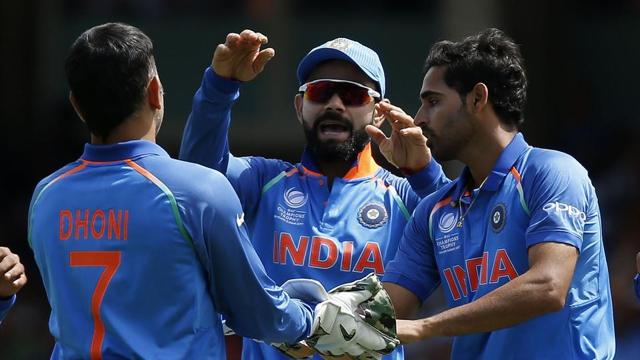 Bhuvneshwar Kumar celebrates with skipper Virat Kohli and MS Dhoni after taking a wicket during India vs South Africa ICC Champions Trophy 2017 clash. (AFP) Bhuvneshwar Kumar celebrates with skipper Virat Kohli and MS Dhoni after taking a wicket during India vs South Africa ICC Champions Trophy 2017 clash. (AFP)