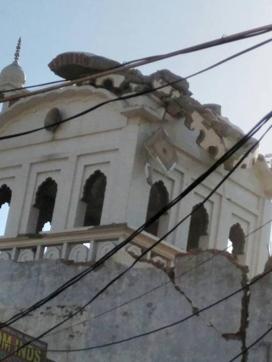 A portion of the gurdwara wall collapsed on Monday. (HT Photo)