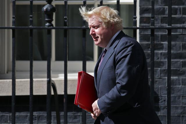 Boris Johnson leaves after attending a Cabinet meeting at 10 Downing Street. (AFP Photo)