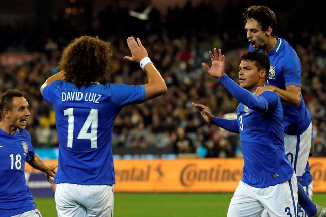 Brazil's Thiago Silva celebrates with his teammates after scoring the second goal. (REUTERS) Brazil's Thiago Silva celebrates with his teammates after scoring the second goal. (REUTERS)