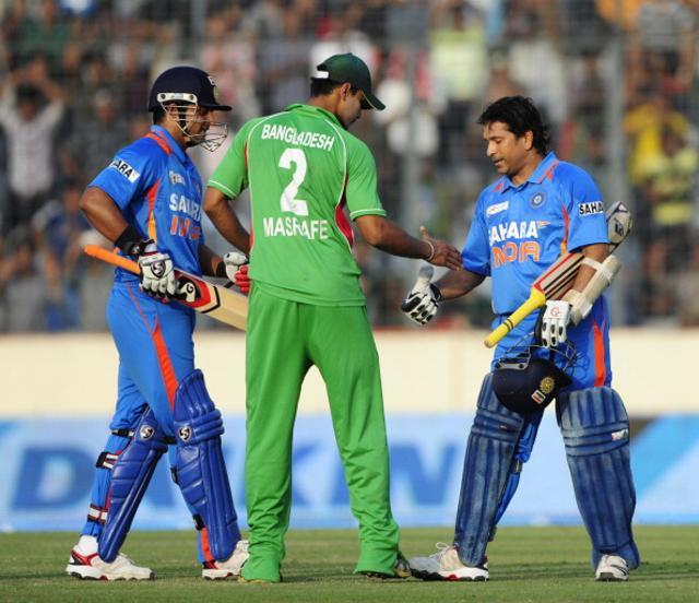 Sachin Tendulkar (R) completed 100 international centuries during India’s 2012 Asia Cup match against Bangladesh. (AFP/Getty Images) Sachin Tendulkar (R) completed 100 international centuries during India’s 2012 Asia Cup match against Bangladesh. (AFP/Getty Images)