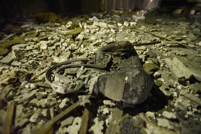 A handbag among the rubble. The cinema hall was constructed in 1973. A transformer had caught fire, which spread to the parking lot, leading to the smoke in the auditorium. (Burhaan Kinu/HT PHOTO) A handbag among the rubble. The cinema hall was constructed in 1973. A transformer had caught fire, which spread to the parking lot, leading to the smoke in the auditorium. (Burhaan Kinu/HT PHOTO)