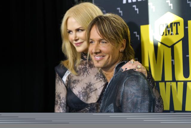 Keith Urban, right, and Nicole Kidman arrive at the CMT Music Awards at Music City Centre. (Sanford Myers/Invision/AP)