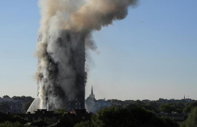 Man seen waving jumper from Grenfell window is rescued after being trapped  in burning building for 12 hours - Mirror Online