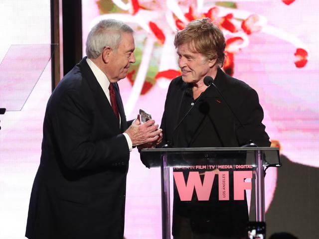 Journalist and The Norma Zarky Humanitarian Award Honoree Dan Rather receives award onstage from actor Robert Redford at the Women In Film 2017 Crystal + Lucy Awards. (AFP) Journalist and The Norma Zarky Humanitarian Award Honoree Dan Rather receives award onstage from actor Robert Redford at the Women In Film 2017 Crystal + Lucy Awards. (AFP)