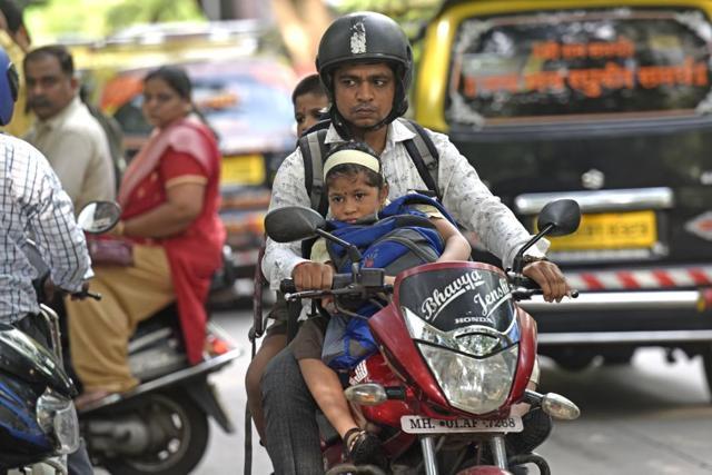 This little girl is clearly not excited to go back to school. (Pratik Chorge)