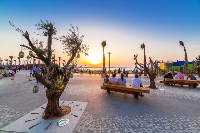People watching the sunset at Dubai Marina. (Shutterstock) People watching the sunset at Dubai Marina. (Shutterstock)