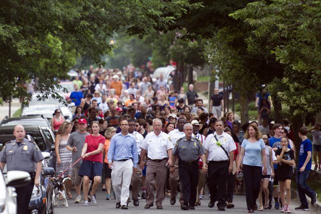 People walk to a church to say a prayer near the baseball field, the scene of a multiple shooting in Alexandria, Va., Wednesday, June 14, 2017. (AP Photo)