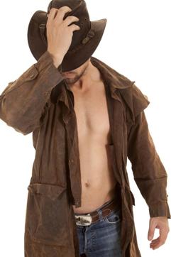 A man wearing a duster and holding on to his western hat. (Shutterstock) A man wearing a duster and holding on to his western hat. (Shutterstock)