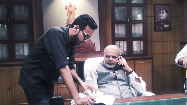 Director Tushar Amrish Goel with Vikas Mahante, as PM Narendra Modi, while shooting for Modi Ka Gaon. Director Tushar Amrish Goel with Vikas Mahante, as PM Narendra Modi, while shooting for Modi Ka Gaon.