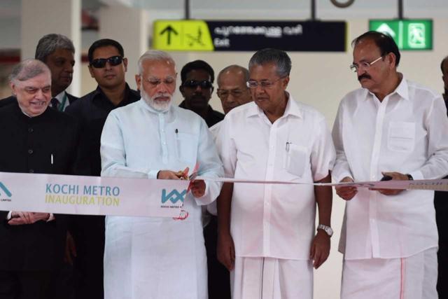 Prime Minister Narendra Modi inaugurates the first phase of the completed stretch of Kochi Metro on Saturday. Chief minister Pinarayi Vijayan, urban development minister Venkaiah Naidu, Kerala Governor P Sathasivam and ‘Metro Man’ E Sreedharan are also seen. (PIB India) Prime Minister Narendra Modi inaugurates the first phase of the completed stretch of Kochi Metro on Saturday. Chief minister Pinarayi Vijayan, urban development minister Venkaiah Naidu, Kerala Governor P Sathasivam and ‘Metro Man’ E Sreedharan are also seen. (PIB India)