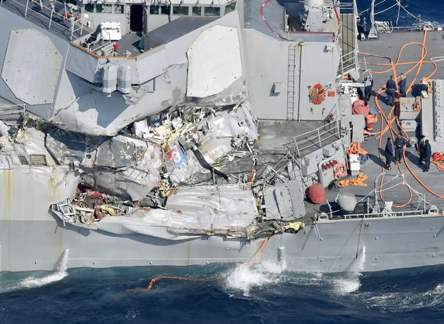 The damage of the right side of the USS Fitzgerald is seen off Shimoda, Shizuoka prefecture, Japan, after the Navy destroyer collided with a merchant ship. (AP Photo) The damage of the right side of the USS Fitzgerald is seen off Shimoda, Shizuoka prefecture, Japan, after the Navy destroyer collided with a merchant ship. (AP Photo)