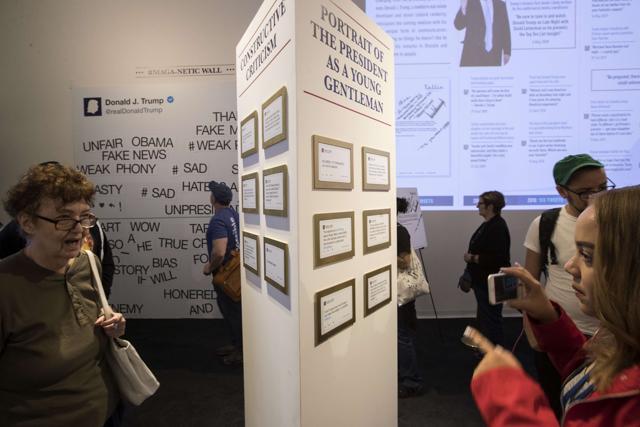 Guests view an exhibit at The Daily Show-produced 'Donald J. Trump Presidential Twitter Library in New York City. (AFP Photo) Guests view an exhibit at The Daily Show-produced 'Donald J. Trump Presidential Twitter Library in New York City. (AFP Photo)