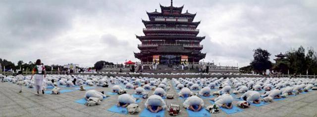 Yoga enthusiasts participate in an event to celebrate 3rd International Day of Yoga in Wenzhou, China on June 18, 2017. (PTI) Yoga enthusiasts participate in an event to celebrate 3rd International Day of Yoga in Wenzhou, China on June 18, 2017. (PTI)