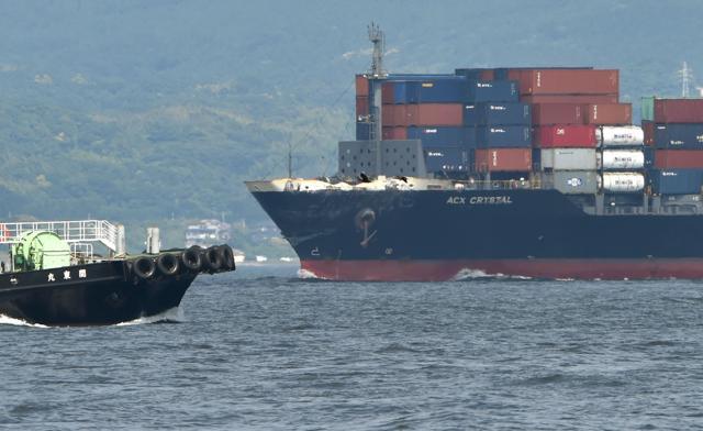 Damages on the Philippine-flagged container ship ACX Crystarl after it collided with the guided missile destroyer USS Fitzgerald sails into Tokyo bay. (AFP Photo) Damages on the Philippine-flagged container ship ACX Crystarl after it collided with the guided missile destroyer USS Fitzgerald sails into Tokyo bay. (AFP Photo)