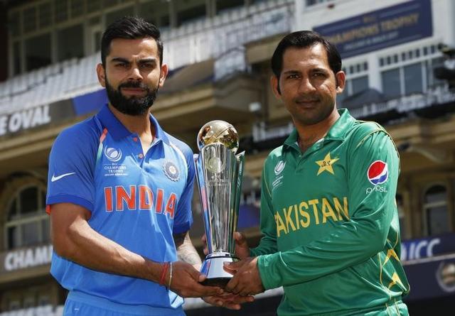 India & Pakistan Nets - The Oval : Pakistan's Sarfraz Ahmed and India's Virat Kohli pose with the trophy. (Reuters) India & Pakistan Nets - The Oval : Pakistan's Sarfraz Ahmed and India's Virat Kohli pose with the trophy. (Reuters)
