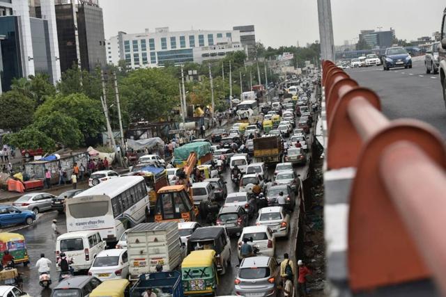 Traffic jam at Hero Honda Chowk in Gurgaon on Monday morning. (Sanjeev Verma / HT Photo) Traffic jam at Hero Honda Chowk in Gurgaon on Monday morning. (Sanjeev Verma / HT Photo)