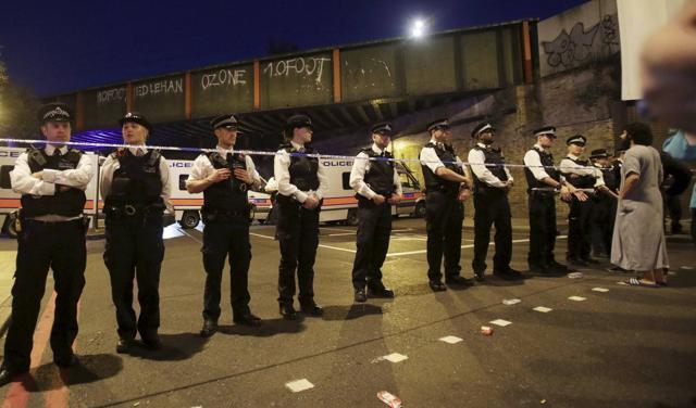 Police officers man a cordon at Finsbury Park where a vehicle struck pedestrians in London on Monday. (AP) Police officers man a cordon at Finsbury Park where a vehicle struck pedestrians in London on Monday. (AP)