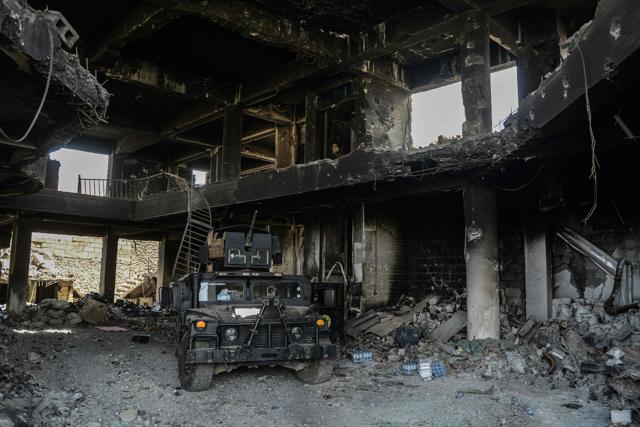 Iraqi forces hold a position inside a damaged building as troops advance towards Mosul's Old City. (AFP) Iraqi forces hold a position inside a damaged building as troops advance towards Mosul's Old City. (AFP)