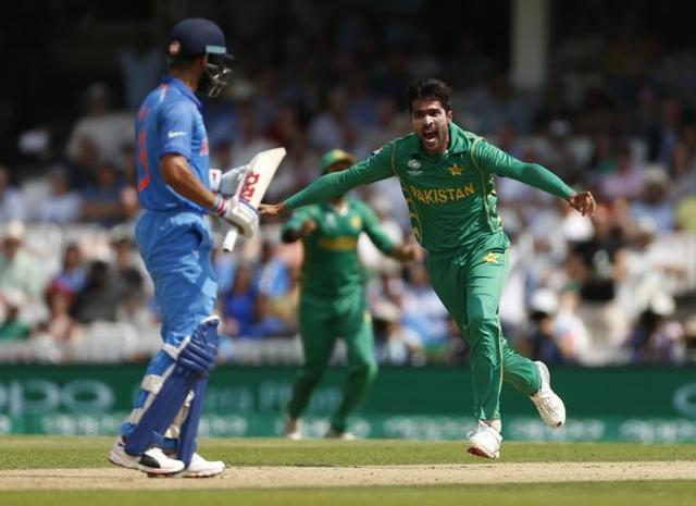 Pakistan’s Mohammad Amir celebrates taking the wicket of India’s Virat Kohli. (REUTERS) Pakistan’s Mohammad Amir celebrates taking the wicket of India’s Virat Kohli. (REUTERS)