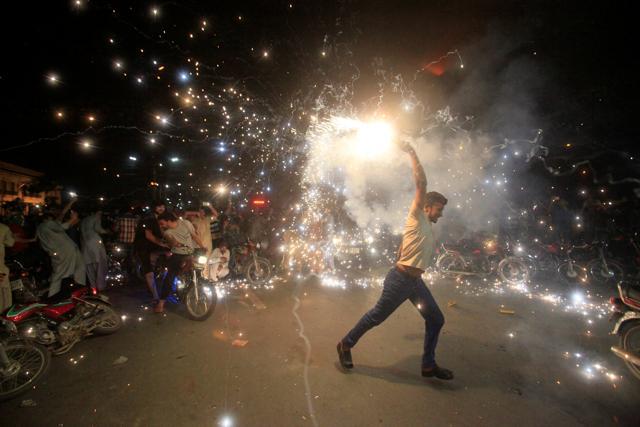 Pakistani cricket fans cheer after Pakistan defeated India in the Champions Trophy finals, in Lahore. (REUTERS) Pakistani cricket fans cheer after Pakistan defeated India in the Champions Trophy finals, in Lahore. (REUTERS)