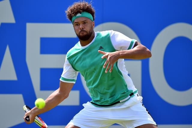 France's Jo-Wilfried Tsonga returns against France's Adrian Mannarino. (AFP) France's Jo-Wilfried Tsonga returns against France's Adrian Mannarino. (AFP)