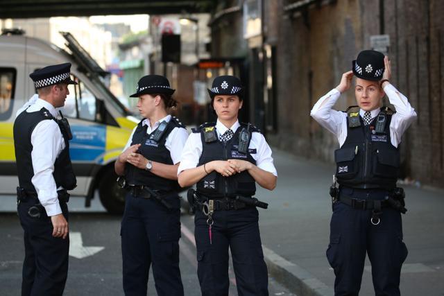 Police officers stand guard, close to the scene of a van attack in Finsbury Park, north London. (AFP) Police officers stand guard, close to the scene of a van attack in Finsbury Park, north London. (AFP)