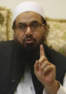 In this file photo, Hafiz Saeed, head of Jamaat-ud-Dawa and wanted by Pakistan, speaks to the Associated Press in Lahore. (AP) In this file photo, Hafiz Saeed, head of Jamaat-ud-Dawa and wanted by Pakistan, speaks to the Associated Press in Lahore. (AP)