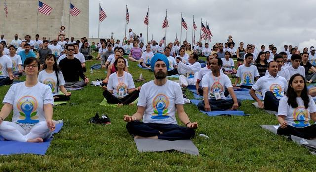 Indian Ambassador to US Navtej Sarna joining yoga enthusiasts to celebrate international yoga day at the National Mall in Washington DC on Saturday. (PTI) Indian Ambassador to US Navtej Sarna joining yoga enthusiasts to celebrate international yoga day at the National Mall in Washington DC on Saturday. (PTI)