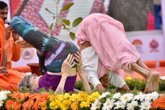 World’s oldest Yoga teacher, New-York based Tao Porchon-Lynch, 98 and a half year-old and India’s oldest yoga teacher Amma Nannamal, 98 years-old perform yoga on the International Day of Yoga at Kanteerava Stadium in Bengaluru, Karnataka. (ARIJIT SEN/HT Photo) World’s oldest Yoga teacher, New-York based Tao Porchon-Lynch, 98 and a half year-old and India’s oldest yoga teacher Amma Nannamal, 98 years-old perform yoga on the International Day of Yoga at Kanteerava Stadium in Bengaluru, Karnataka. (ARIJIT SEN/HT Photo)