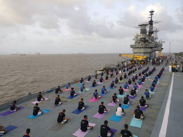 Indian naval cadets perform yoga on the deck of INS Virat in Mumbai. (Pratik Chorge/HT Photo) Indian naval cadets perform yoga on the deck of INS Virat in Mumbai. (Pratik Chorge/HT Photo)