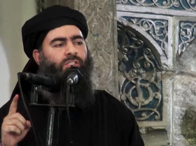 This image made from video posted on a militant website Saturday, July 5, 2014, purports to show the leader of the Islamic State group, Abu Bakr al-Baghdadi, delivering a sermon at a mosque in Iraq during his first public appearance. (AP File Photo) This image made from video posted on a militant website Saturday, July 5, 2014, purports to show the leader of the Islamic State group, Abu Bakr al-Baghdadi, delivering a sermon at a mosque in Iraq during his first public appearance. (AP File Photo)