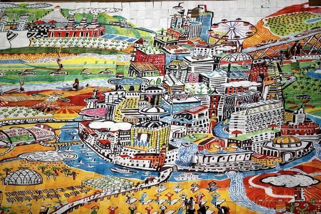 People walk on 1500 yoga mats, printed with an artwork and placed together to form the artwork, during an event marking International Yoga Day, at Rabin Square in Tel Aviv, on June 21, 2017. (Reuters) People walk on 1500 yoga mats, printed with an artwork and placed together to form the artwork, during an event marking International Yoga Day, at Rabin Square in Tel Aviv, on June 21, 2017. (Reuters)