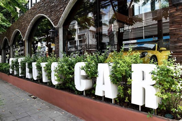 A supercar through the windows of a Bangkok dealership accused of selling stolen cars from the streets of Britain. (AFP) A supercar through the windows of a Bangkok dealership accused of selling stolen cars from the streets of Britain. (AFP)