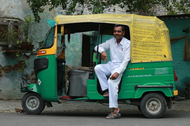 Awadhesh Singh Rathour has come up with the idea to deck up his auto with phrases that promote positive thinking. (Amal KS/ HT Photo )