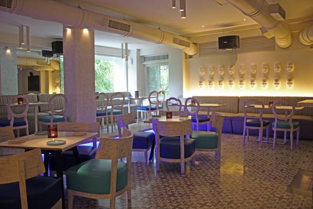 The second-floor, evenings-only restobar is now light and airy, with an overdose of white intensified by icy blue floor lighting. (Satyabrata Tripathy/ HT Photo)
