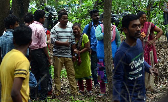 Kin of the victims at the site in Aarey Colony on Thursday. (Prashant Waydande/HT photo)