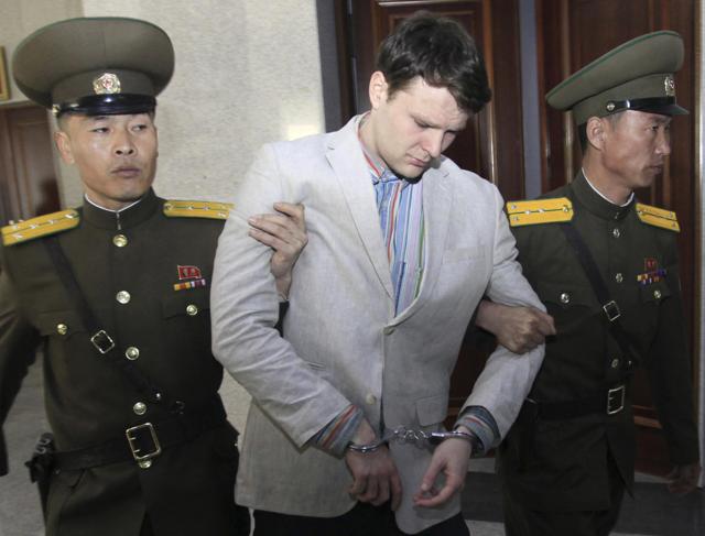 American student Otto Warmbier escorted at the Supreme Court in Pyongyang, North Korea, after his detention. (AP File Photo) American student Otto Warmbier escorted at the Supreme Court in Pyongyang, North Korea, after his detention. (AP File Photo)
