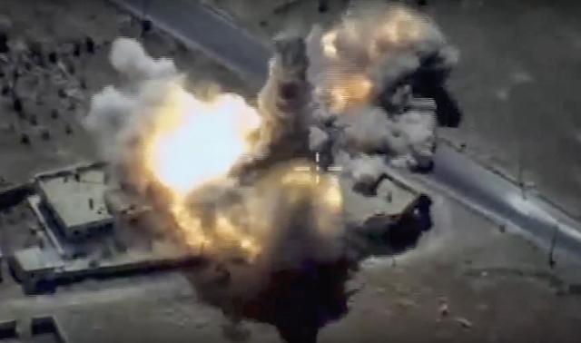 This image provided by the Russian defence ministry press service shows a target in Syria hit by a missile launched from a warship in the Mediterranean. (AP)