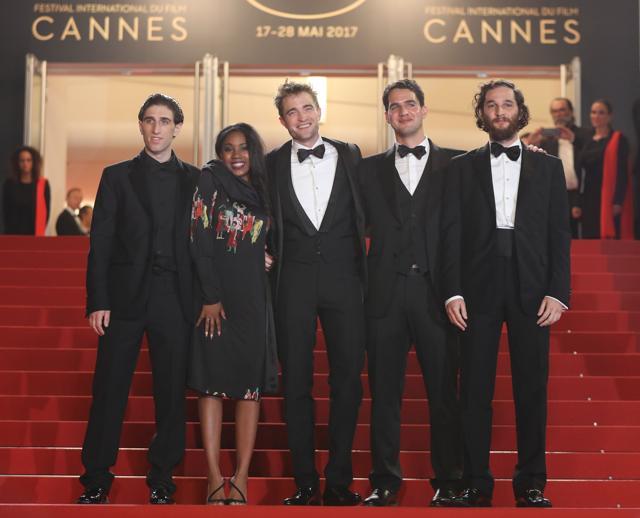 (FromL) US actor Buddy Duress, US actress Taliah Webster, British actor Robert Pattinson, US director Benny Safdie and US director Josh Safdie pose as they arrive on May 25, 2017 for the screening of the film Good Time at the 70th edition of the Cannes Film Festival in Cannes, southern France. (AFP)