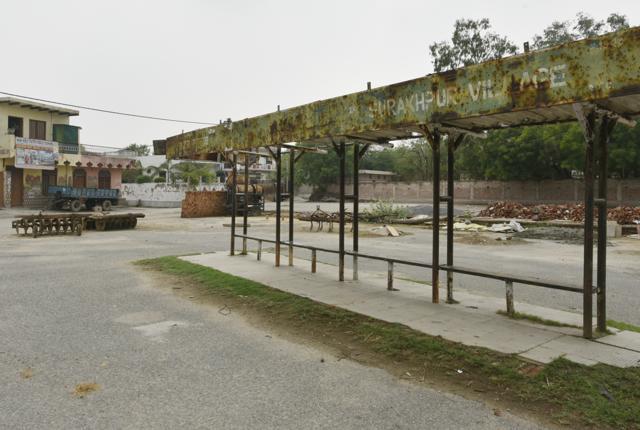 The deserted and dilapidating DTC bus stand. Villagers say DTC buses stopped coming a few years ago. (Vipin Kumar/HT PHOTO) The deserted and dilapidating DTC bus stand. Villagers say DTC buses stopped coming a few years ago. (Vipin Kumar/HT PHOTO)