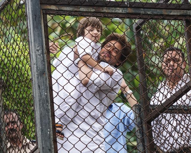 AbRam gets pulled up by dad in his arms. (HT PHOTO/PRAMOD THAKUR)
