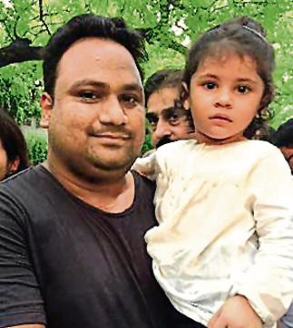 Imtiaz Ahmed Khan with his daughter.