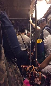 This photo provided by Jonathan @ThisIsJCali from his Twitter page shows subway passengers on a D train stuck on the tracks as it was headed to the 125th street station, before the lights went out in the car, Tuesday, June 27, 2017, in New York. (AP) This photo provided by Jonathan @ThisIsJCali from his Twitter page shows subway passengers on a D train stuck on the tracks as it was headed to the 125th street station, before the lights went out in the car, Tuesday, June 27, 2017, in New York. (AP)