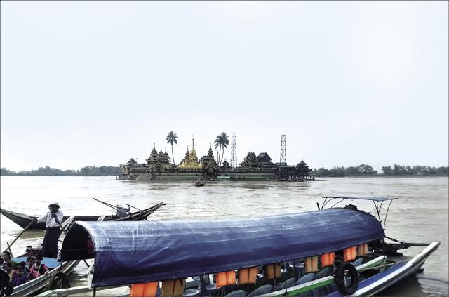 The Ye Le Pagoda is situated on an island in one of the tributaries of the Yangon river (Yamini Nair) The Ye Le Pagoda is situated on an island in one of the tributaries of the Yangon river (Yamini Nair)