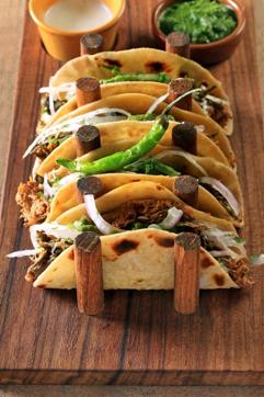 Laal Maas Phulkas tacos served at various Monkey Bar outlets. Ingredients used are red chilli and spice braised lamb with mirch achaar, ker sangri, onion and white radish slaw and garlic- coriander chutney. Laal Maas Phulkas tacos served at various Monkey Bar outlets. Ingredients used are red chilli and spice braised lamb with mirch achaar, ker sangri, onion and white radish slaw and garlic- coriander chutney.