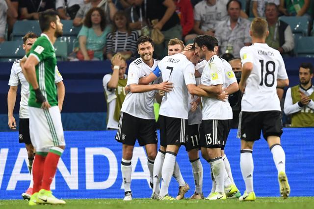 German players celebrate after Germany's midfielder Amin Younes scored during the FIFA Confederations Cup semi-final against Mexico. (AFP) German players celebrate after Germany's midfielder Amin Younes scored during the FIFA Confederations Cup semi-final against Mexico. (AFP)